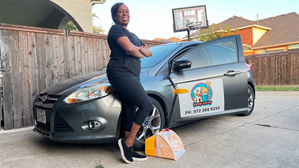 Poop Savvy Team Member by work vehicle